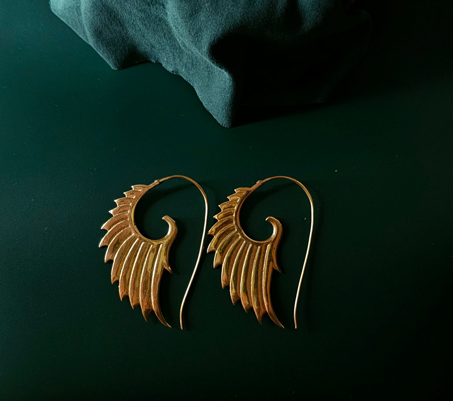 Handcrafted feather brass earring
